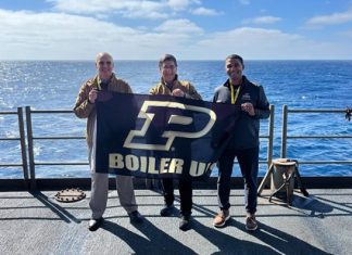 Purdue Delegation Embarks on USS Nimitz, Gains Insights into Naval Operations